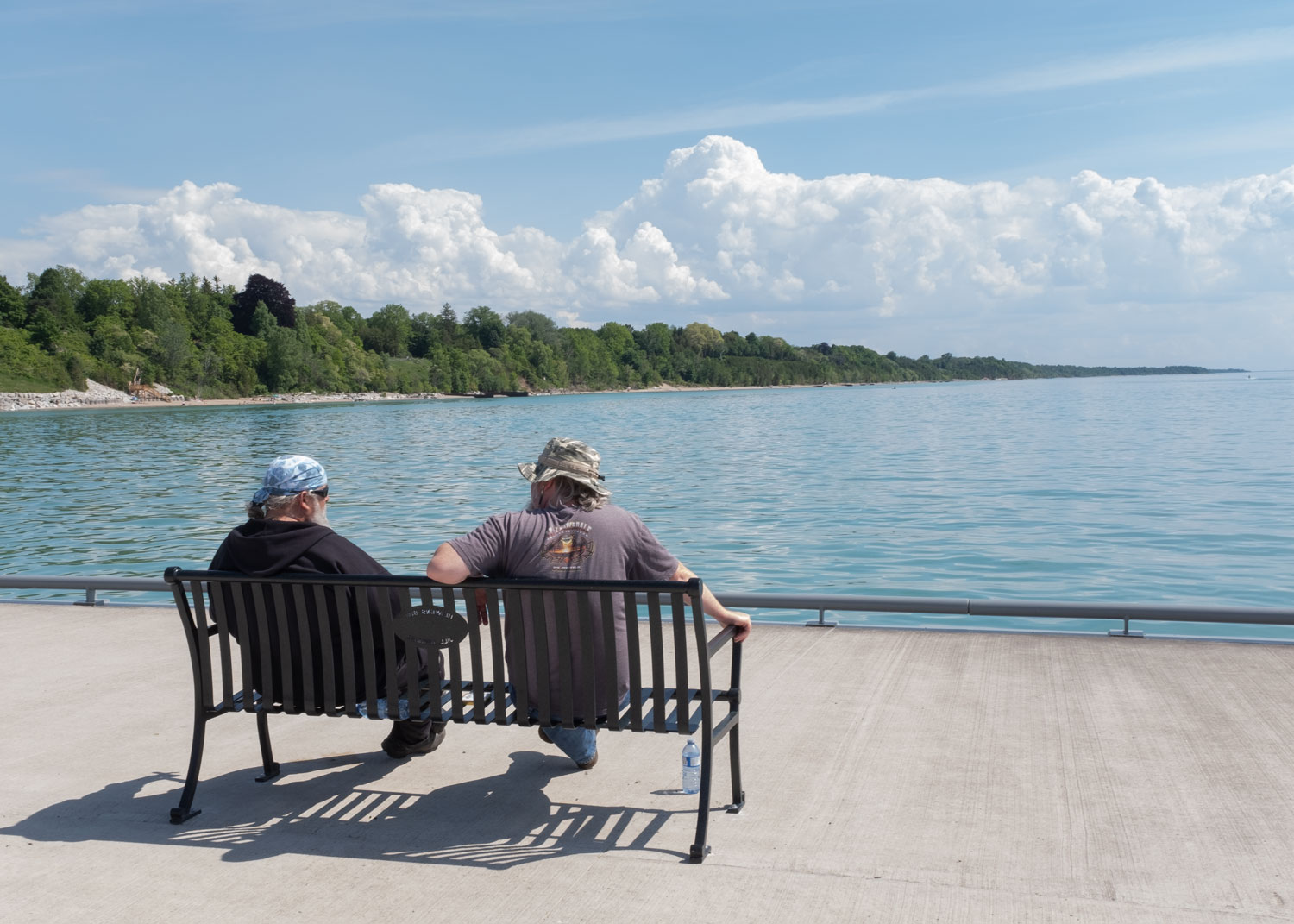 Two older men talking on the boardwalk - Bayfield, Ontario (June 2022)
