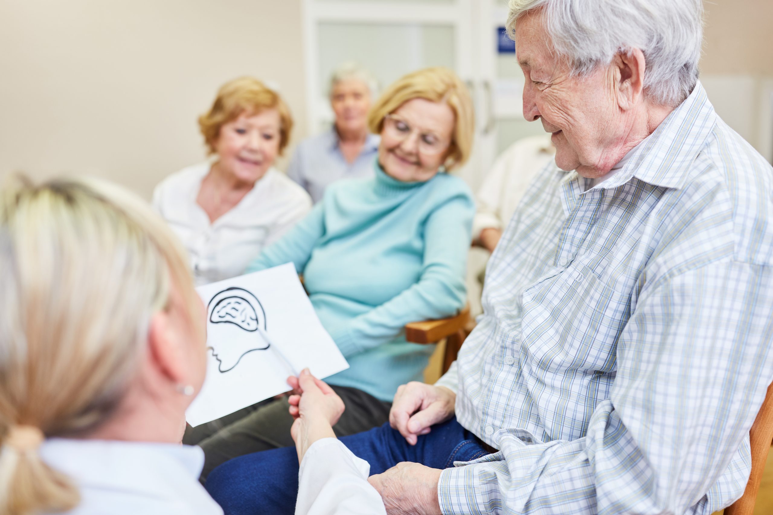 Doctor,As,A,Lecturer,Explains,The,Dementia,Disease,To,Senior